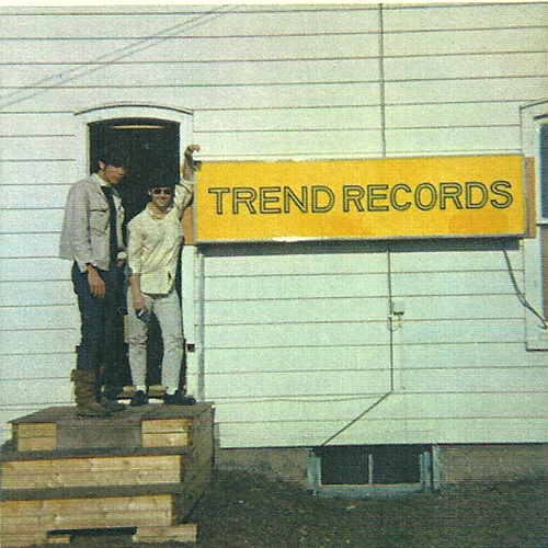 Two Men Standing in the doorway of Trend Records