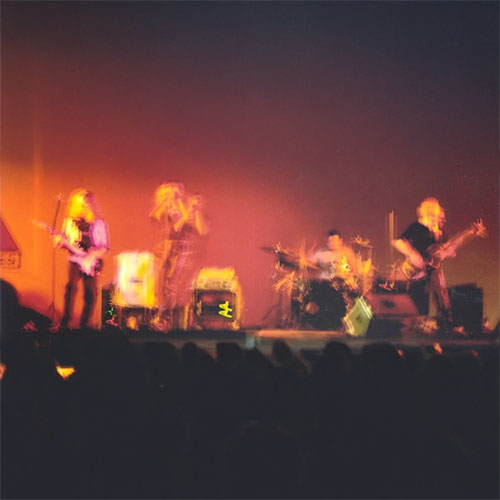 Egodog-on-stage-with-audience