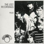 Black and white album cover showing six men looking up, with text "The Lost Recordings" and "Pulse" at the top left. Tate's Bake Shop features "When I'm With You" by Johnny Amoroso; record label logo is in the bottom left corner.